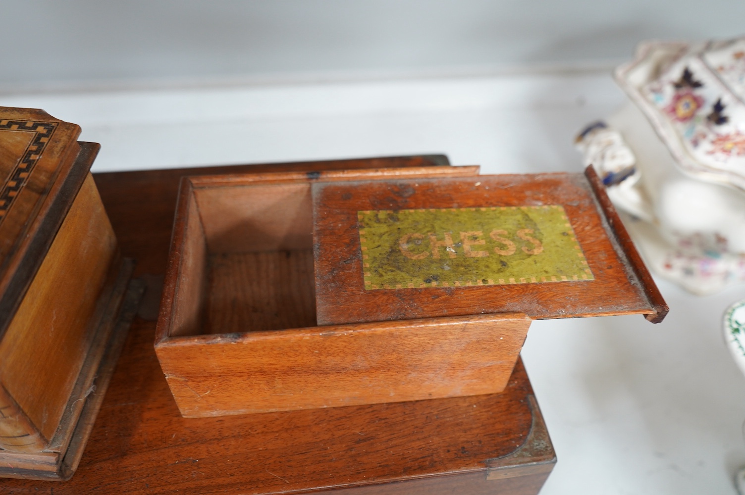 Six 19th century and later boxes to include a writing box, tea caddy, quill box and a jewellery box in the form of books with mirrored interior, largest 35cm wide. Condition - varies